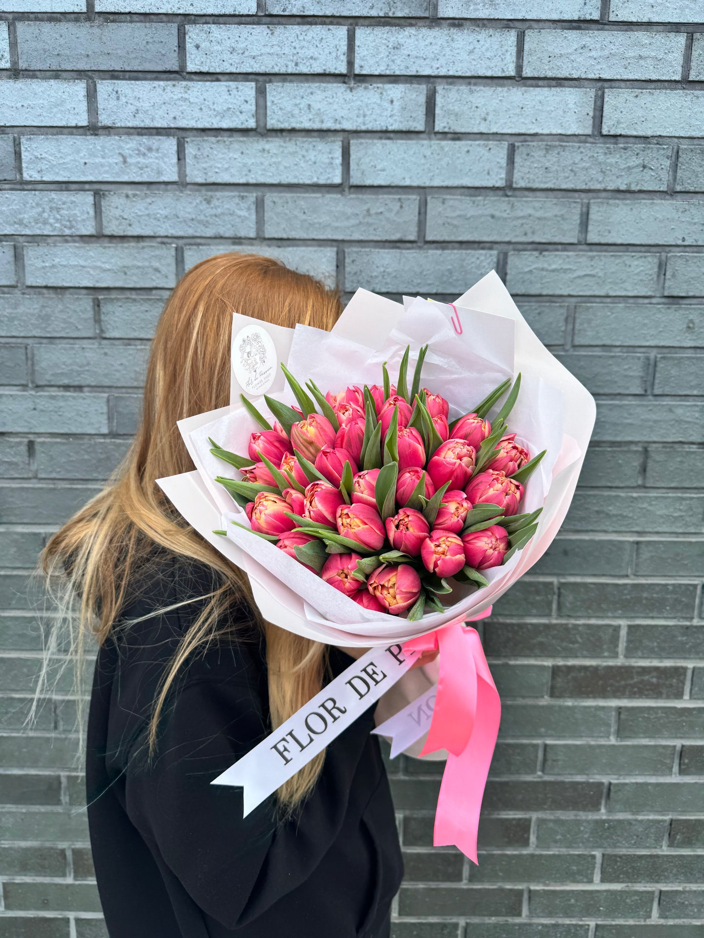 Mono bouquet of coral peony tulips