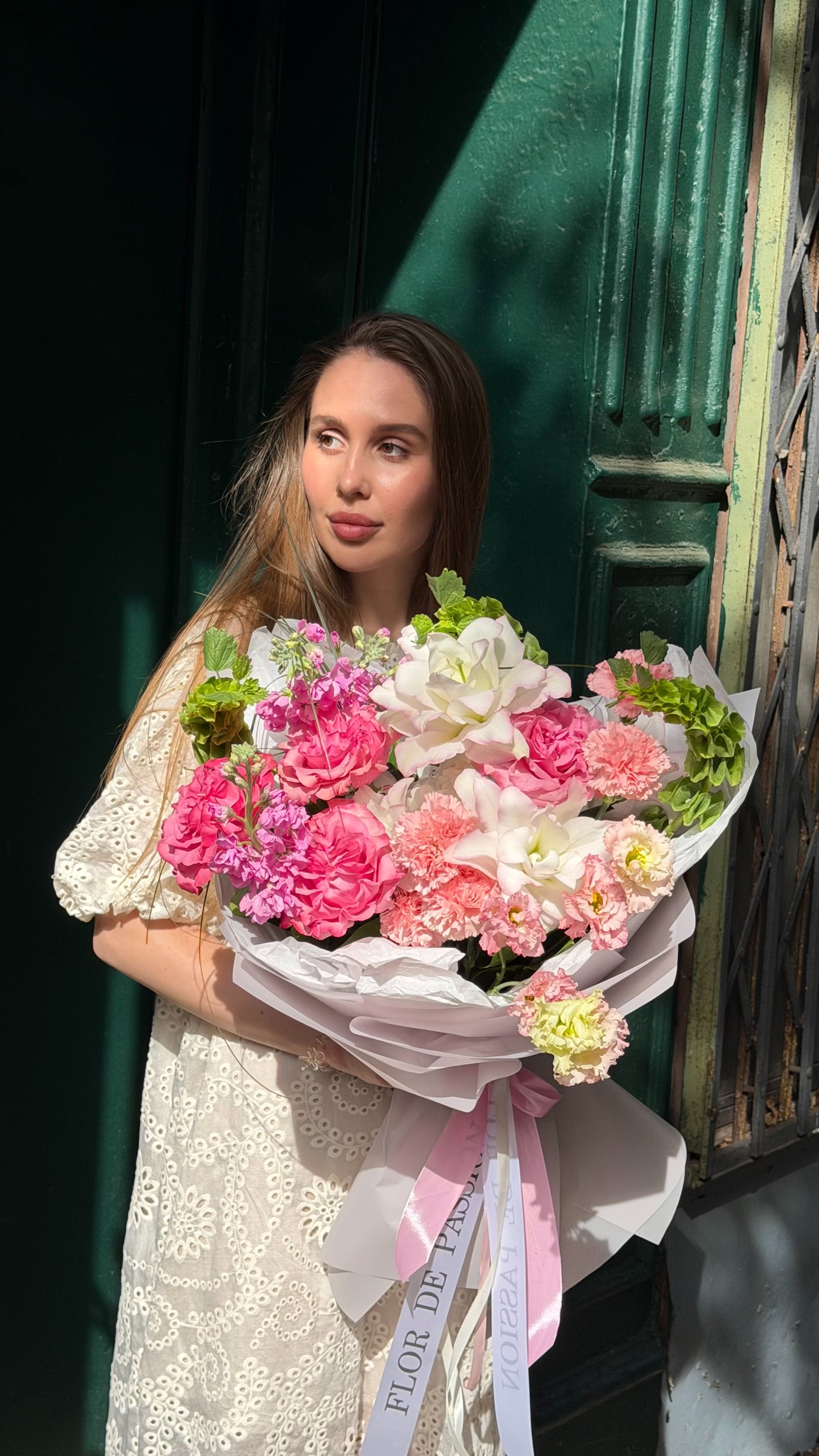 “Berry Fizz” Bouquet (Peony Lilly, Country Blues Peony Roses, Lisianthus, Hydrangea, Stocks, Bear Grass, Carnations, Bells of Ireland)