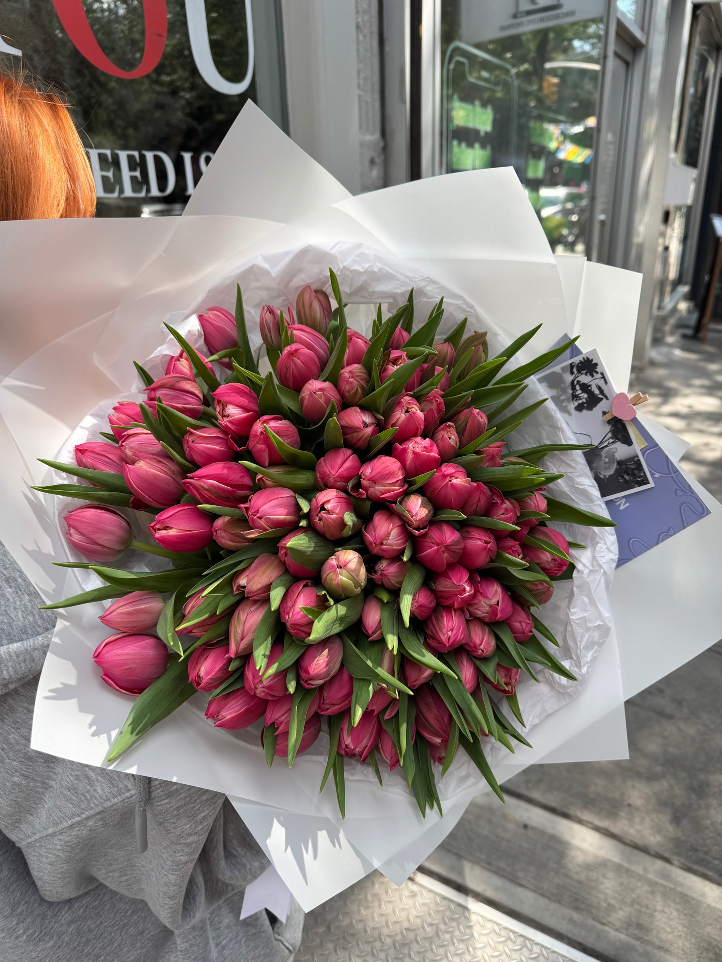 Mono bouquet of coral peony tulips