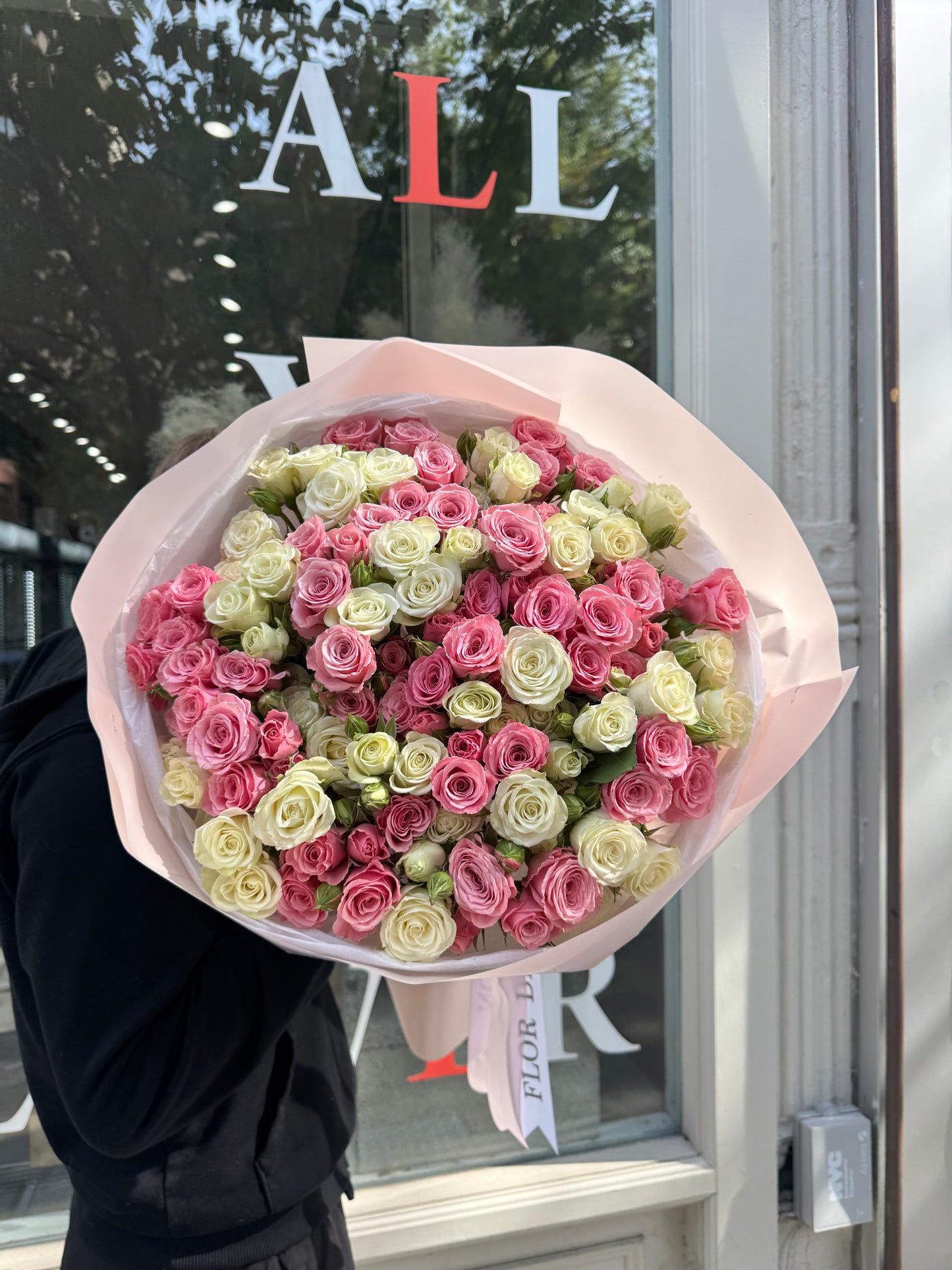 Mix of pink and white spray roses bouquet