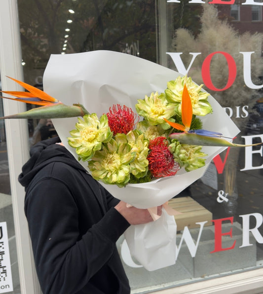 “Birds in Bloom” Bouquet (bird of paradise, veggie rose, pincushion, green balls)