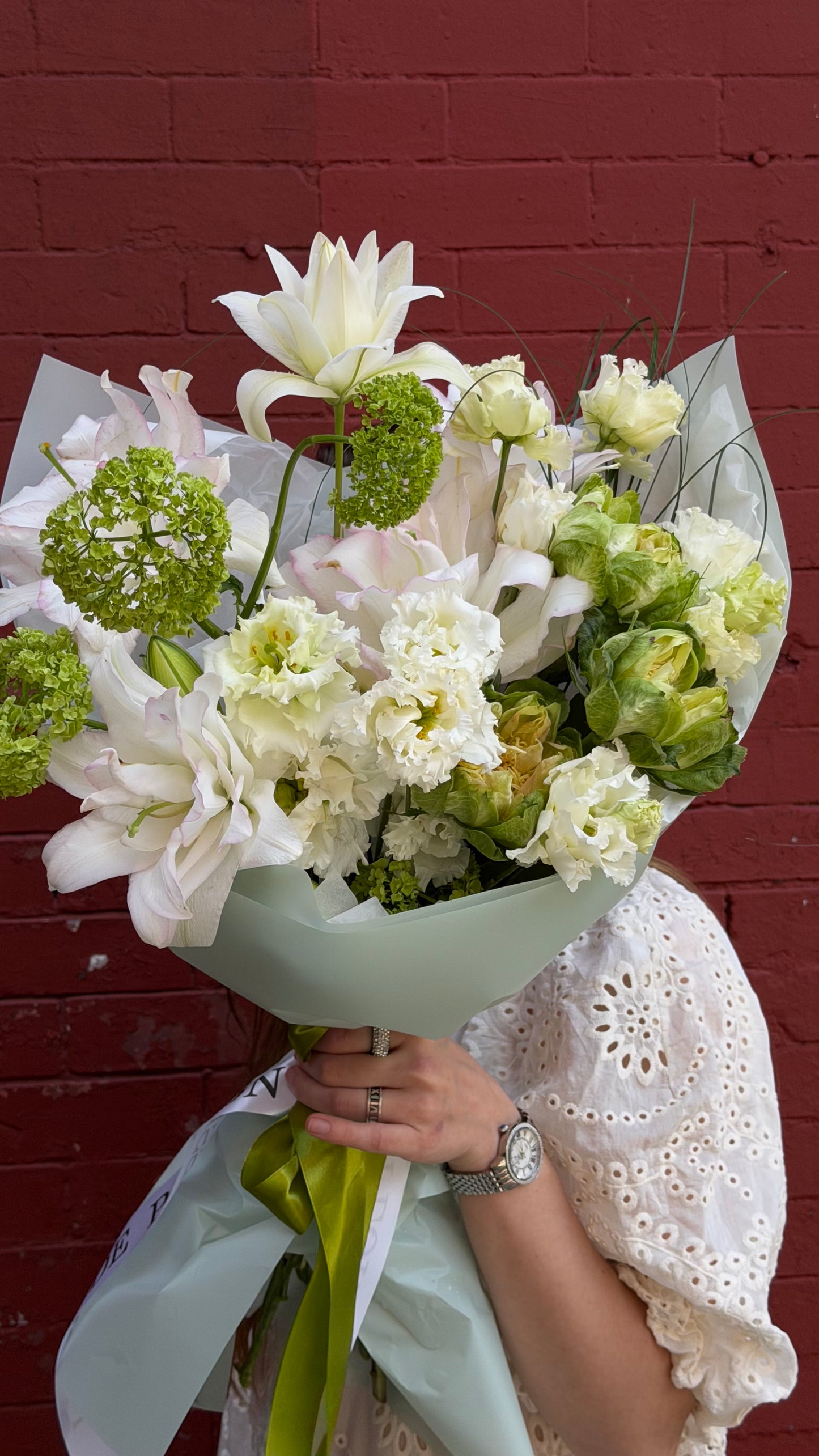 “Zesty” Bouquet (Peony Lilly, Viburnum, Veggie roses, Bear Grass, White Lisianthus)