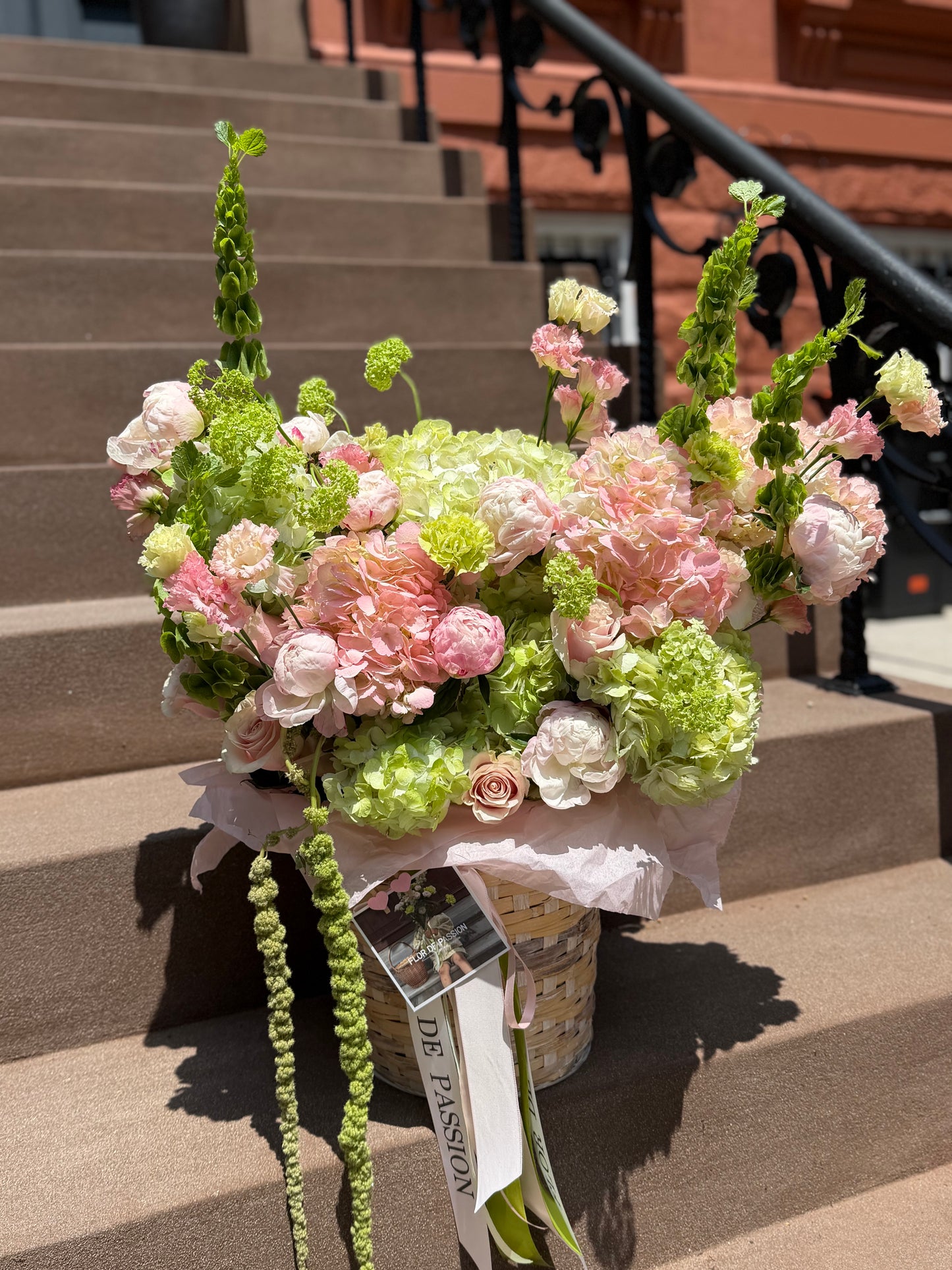 "Brownstone Bloom"Basket (Peonies, Hydrangeas, Lisianthus, Viburnum, Carnations, Roses, Bells of Ireland, Amaranth)