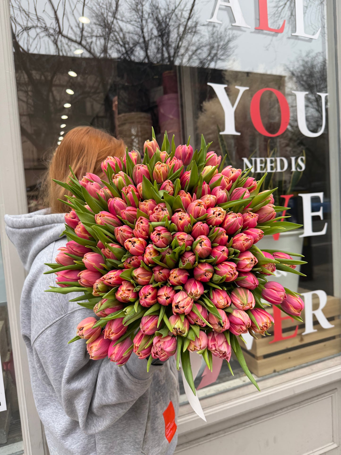 Mono bouquet of coral peony tulips