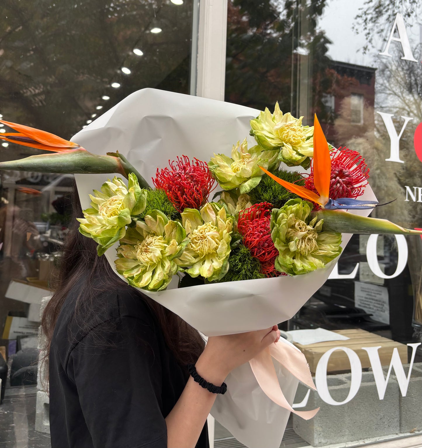 “Birds in Bloom” Bouquet (bird of paradise, veggie rose, pincushion, green balls)