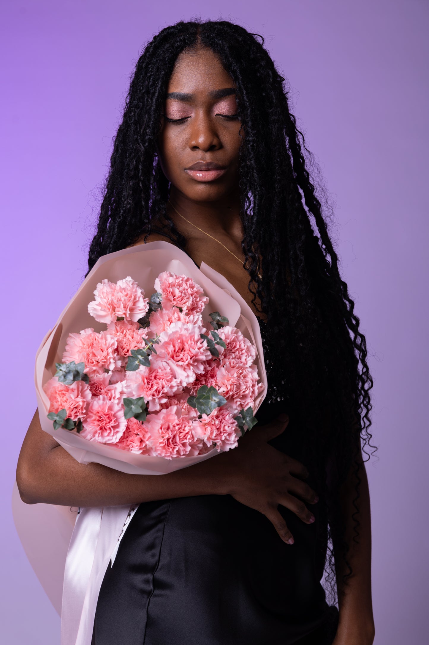 Bouquet of pink dianthuses and eucalyptus